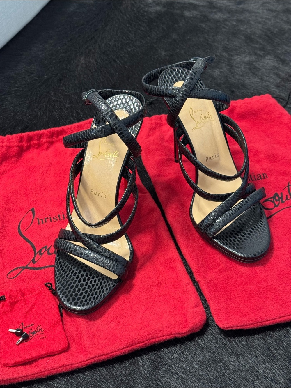 Christian Louboutin Black Snake-Embossed Multi-Strap Stiletto
Sandals